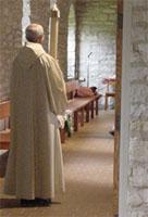 A monk of New Melleray prepares for the funeral of one of his brothers